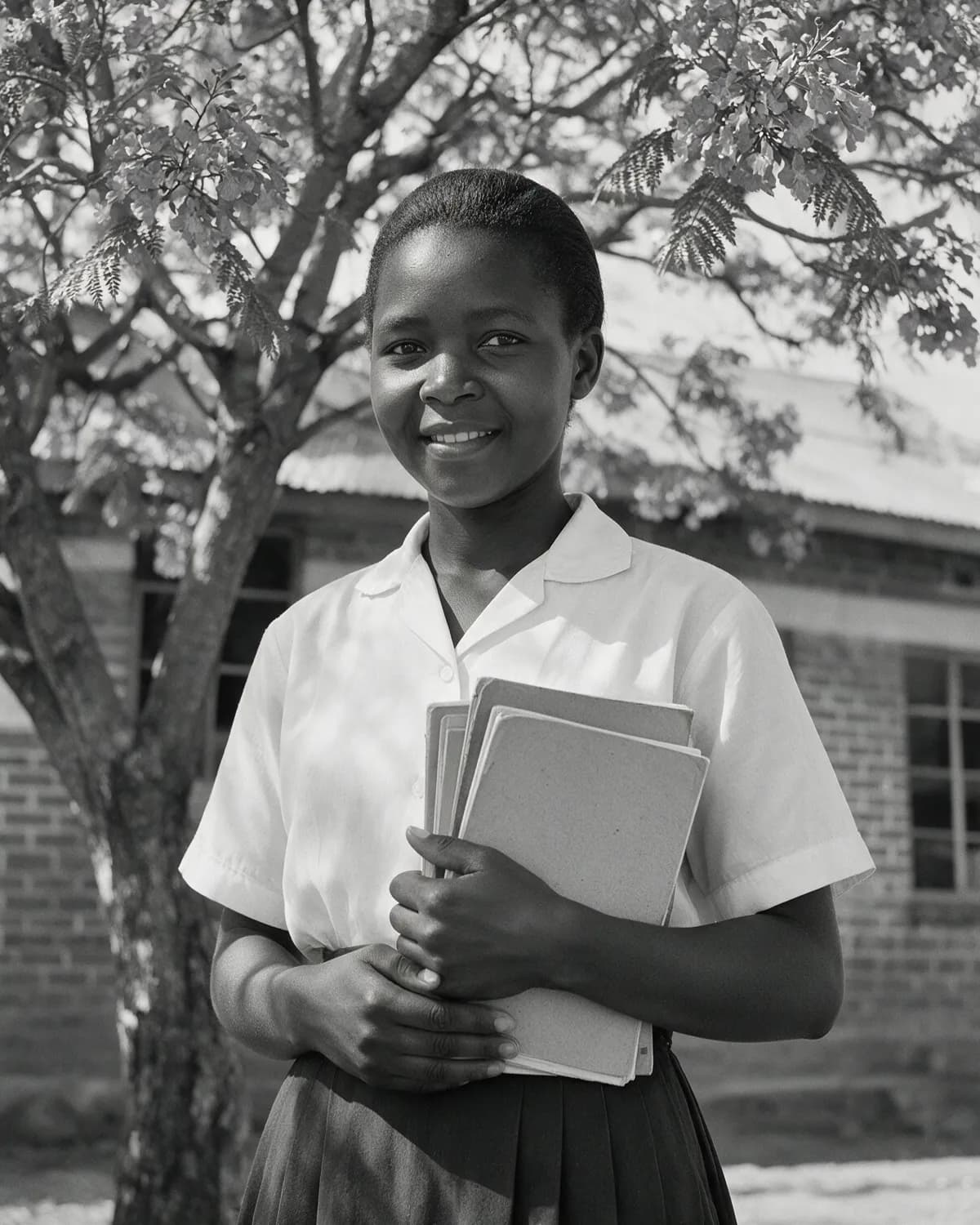 Bubile at eighteen in her school uniform